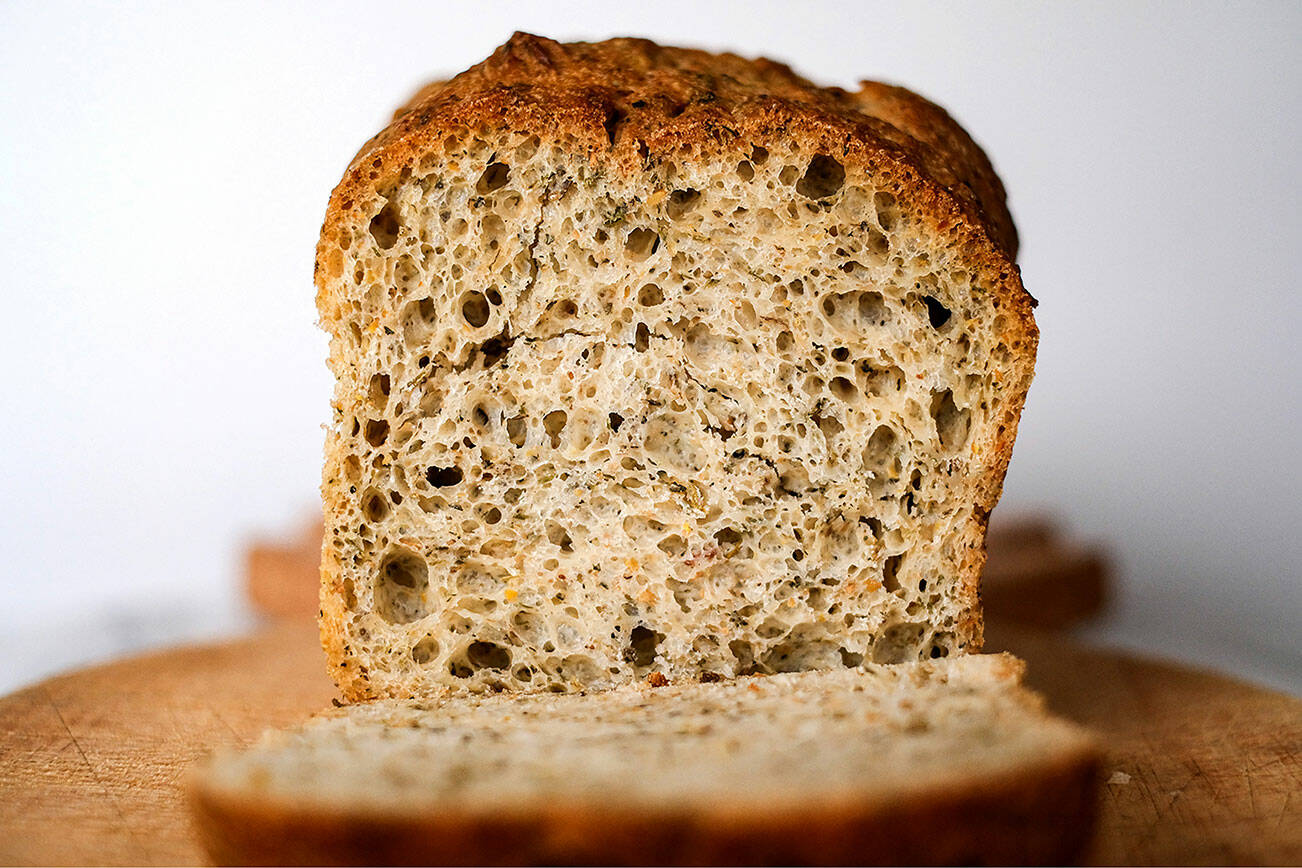 Catalyst Cafe in Everett carries gluten-free breads and other baked goods from Shambala Ancient Grain Bakery & Bistro in Mount Vernon, including this herbed garlic sourdough. Customers can place an order through Catalyst Cafe and pick up right in Everett. Wednesday, March 30, 2022. Taylor Goebel/The Herald.