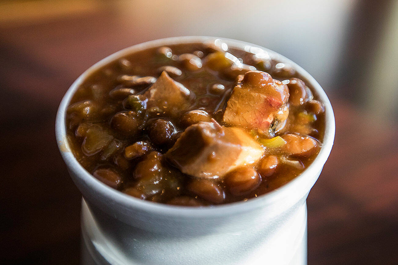 A cup of fresh brisket baked beans from Jeff's Texas Style BBQ. (Olivia Vanni / The Herald)