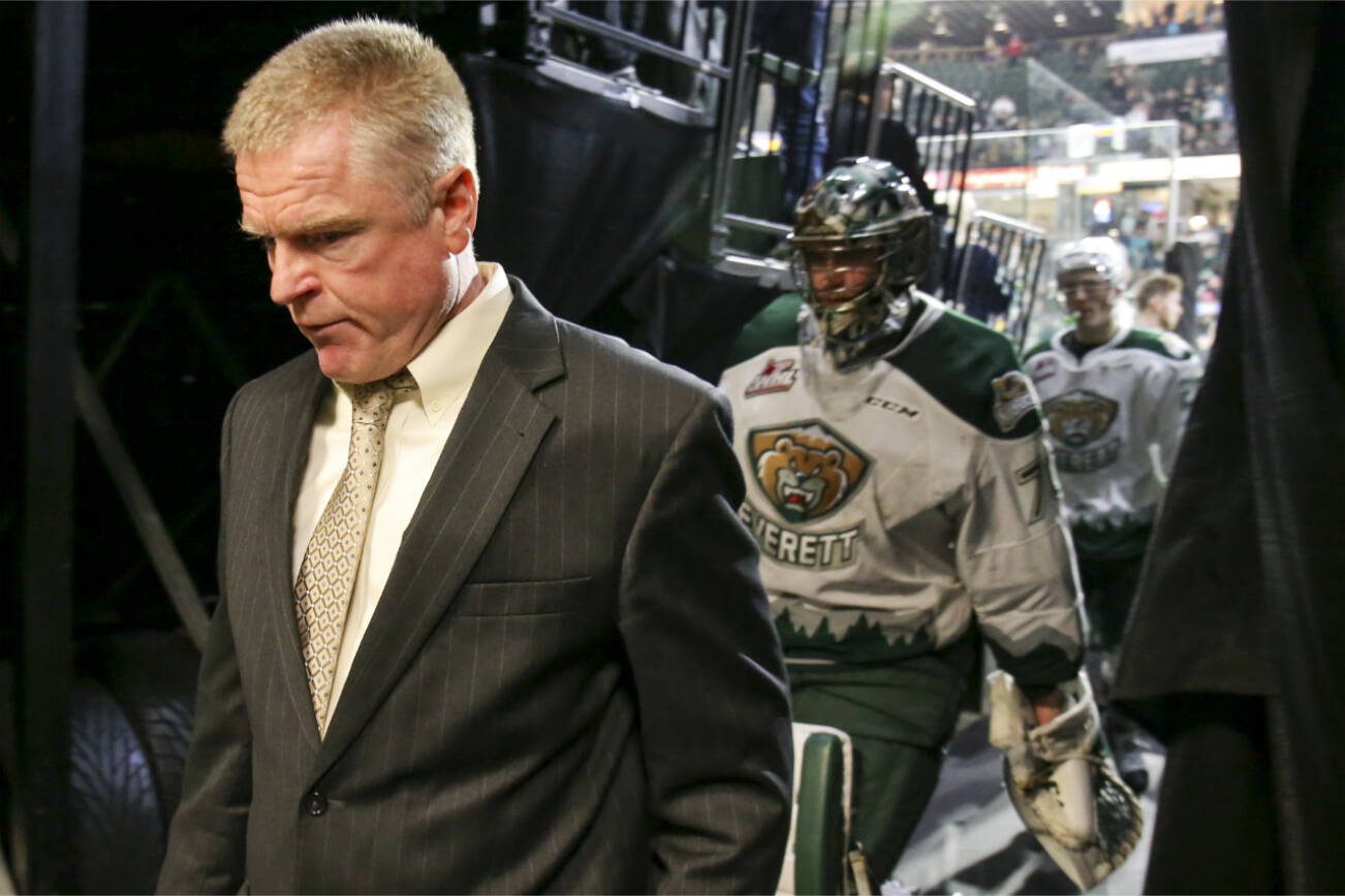 Silvertips head coach Kevin Constantine leads the team off the ice after falling to the Seattle Thunderbirds 4-3 in game 2 of the second round of the playoffs Saturday night at Xfinity Arena on April 8, 2017. (Kevin Clark / The Herald)