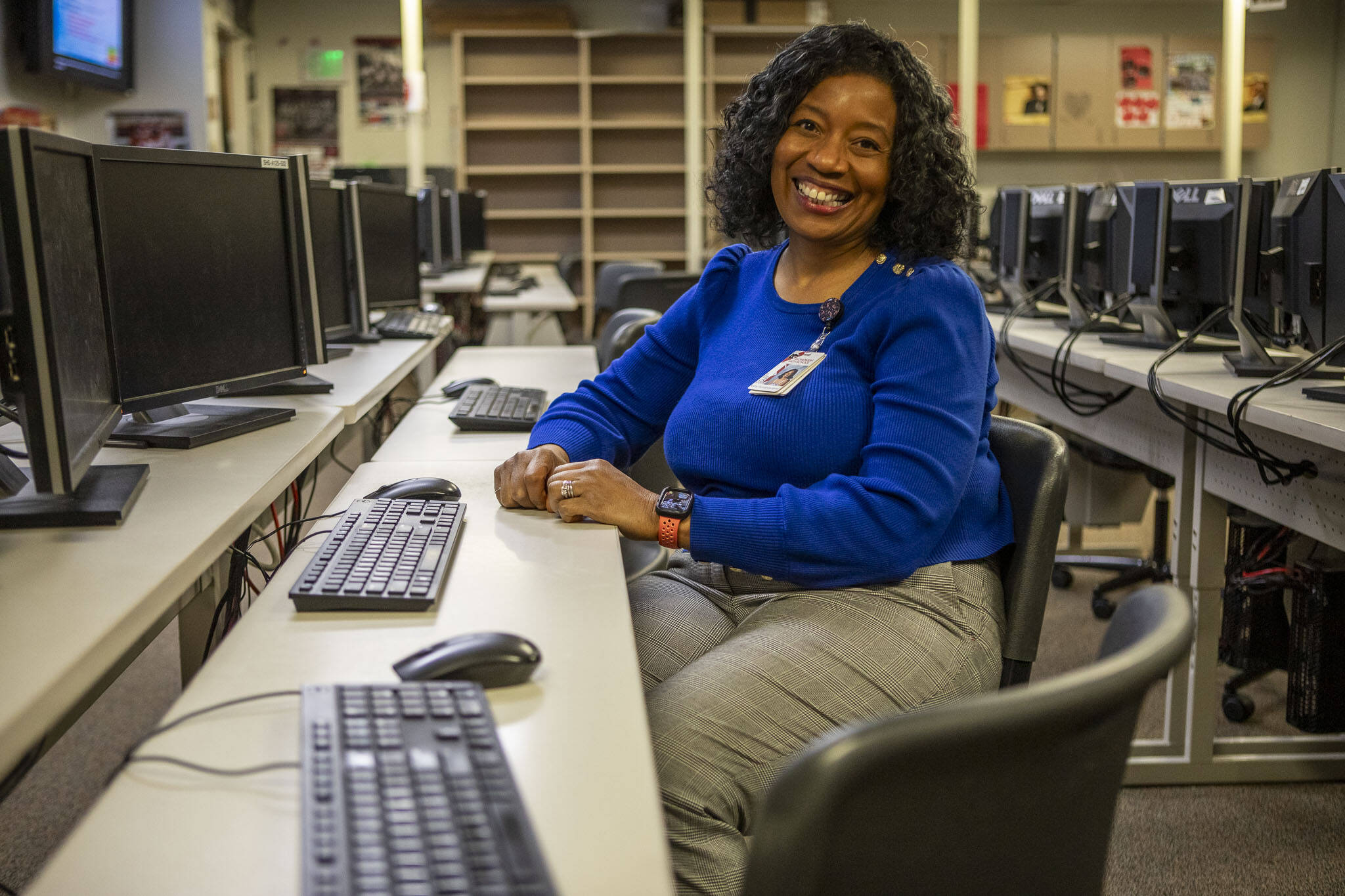 Kathy Purviance-Snow poses for a photo in her computer lab at Snohomish High School on Tuesday, Feb. 27, 2024, in Snohomish, WA. (Annie Barker / The Herald)