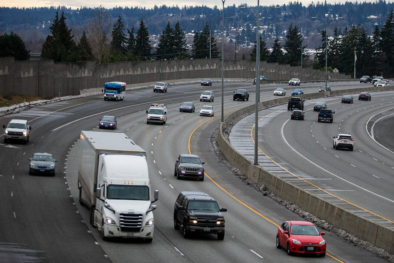 Traffic moves northbound on I-5 through Everett on Friday, Dec. 2, 2022. (Olivia Vanni / The Herald)