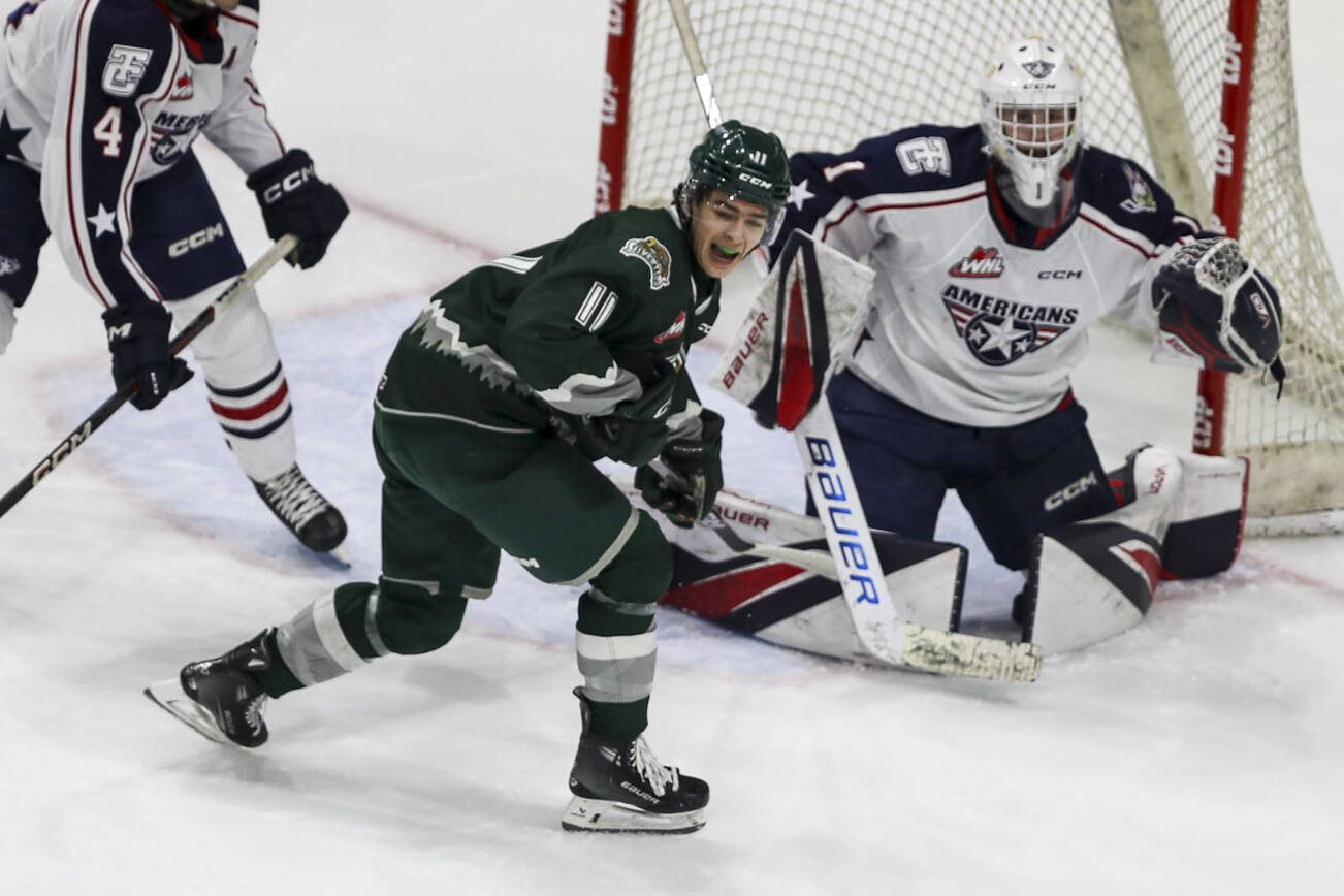 Silvertips’ Carter Bear (11) reacts to a goal during a game between the Everett Silvertips and Tri-City Americans at the Angel of the Winds Arena on Sunday, Jan. 21, 2024. The Silvertips won, 5-3. (Annie Barker / The Herald)