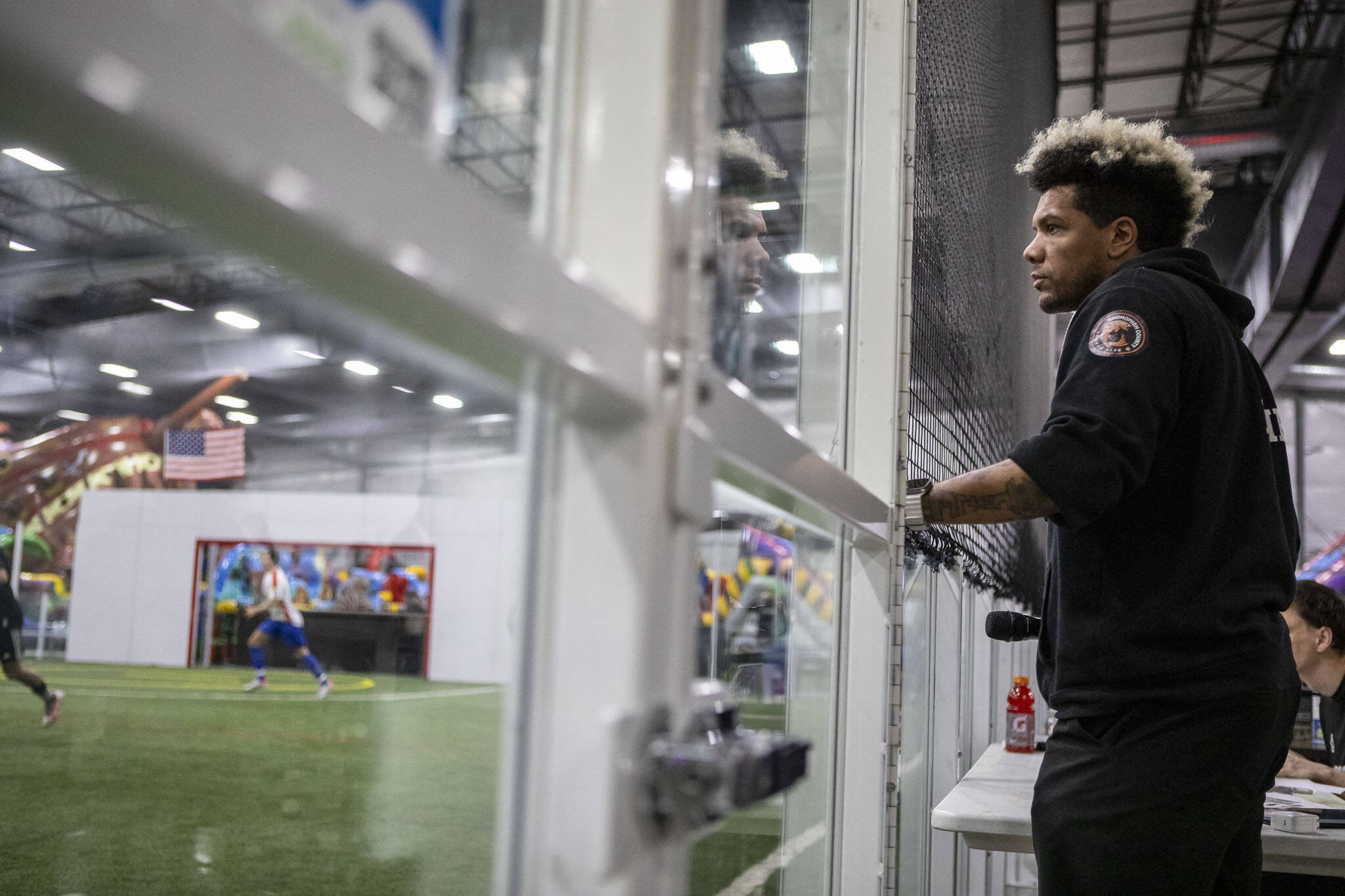 Steelhead team president Dorian Lair acts as the announcer during a game between the Snohomish County Steelheads and Oly-Pen Force at Arena Sports in Mill Creek, Washington on Saturday, Jan. 19, 2024. (Annie Barker / The Herald)