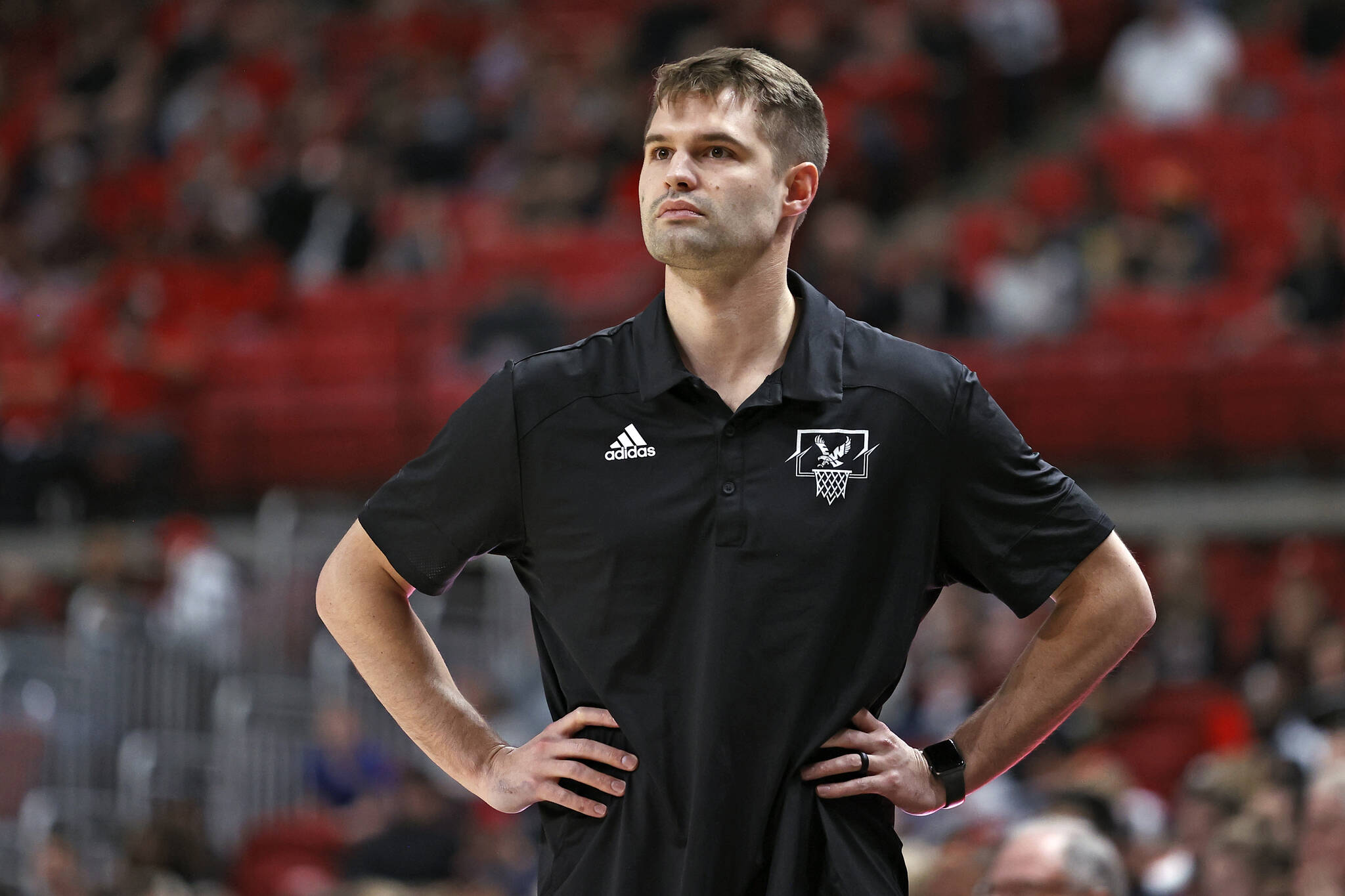 Eastern Washington coach David Riley watches his team during the first half of an NCAA college basketball game against Texas Tech. Washington State hired Riley as its basketball coach on Tuesday, nabbing the two-time Big Sky Conference coach of the year at a time of uncertainty for the Cougars. (AP Photo/Brad Tollefson, File)