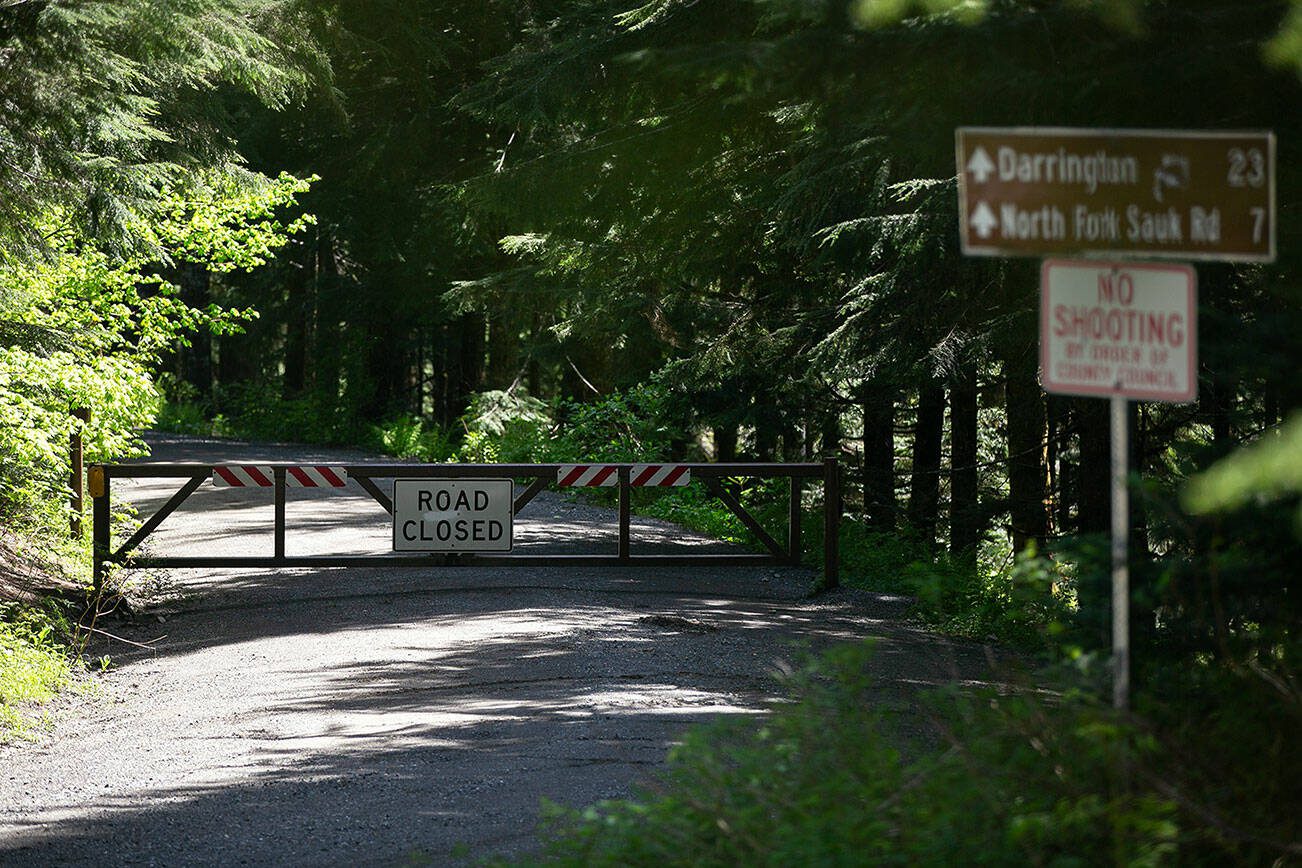 The gate at Barlow Pass Trailhead on Mountain Loop Highway remains closed due to wet conditions on Thursday, June 6, 2024, in rural Snohomish County, Washington. (Ryan Berry / The Herald)