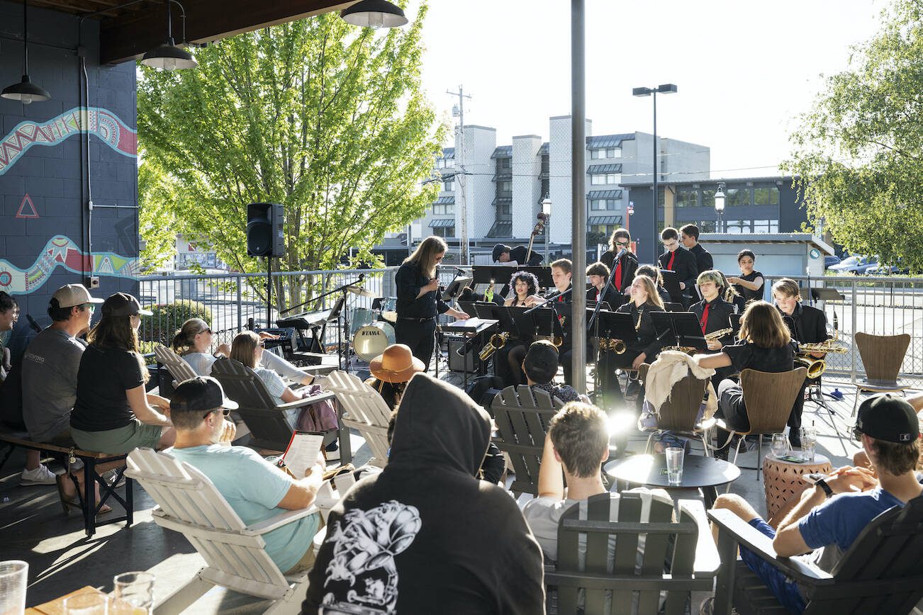 An "Ales for the Arts" event hosted by the Foundation for Edmonds School District in Edmonds, Wash., June  20, 2024. The group is raising money to save music classes from district cuts. (Chona Kasinger/The New York Times)