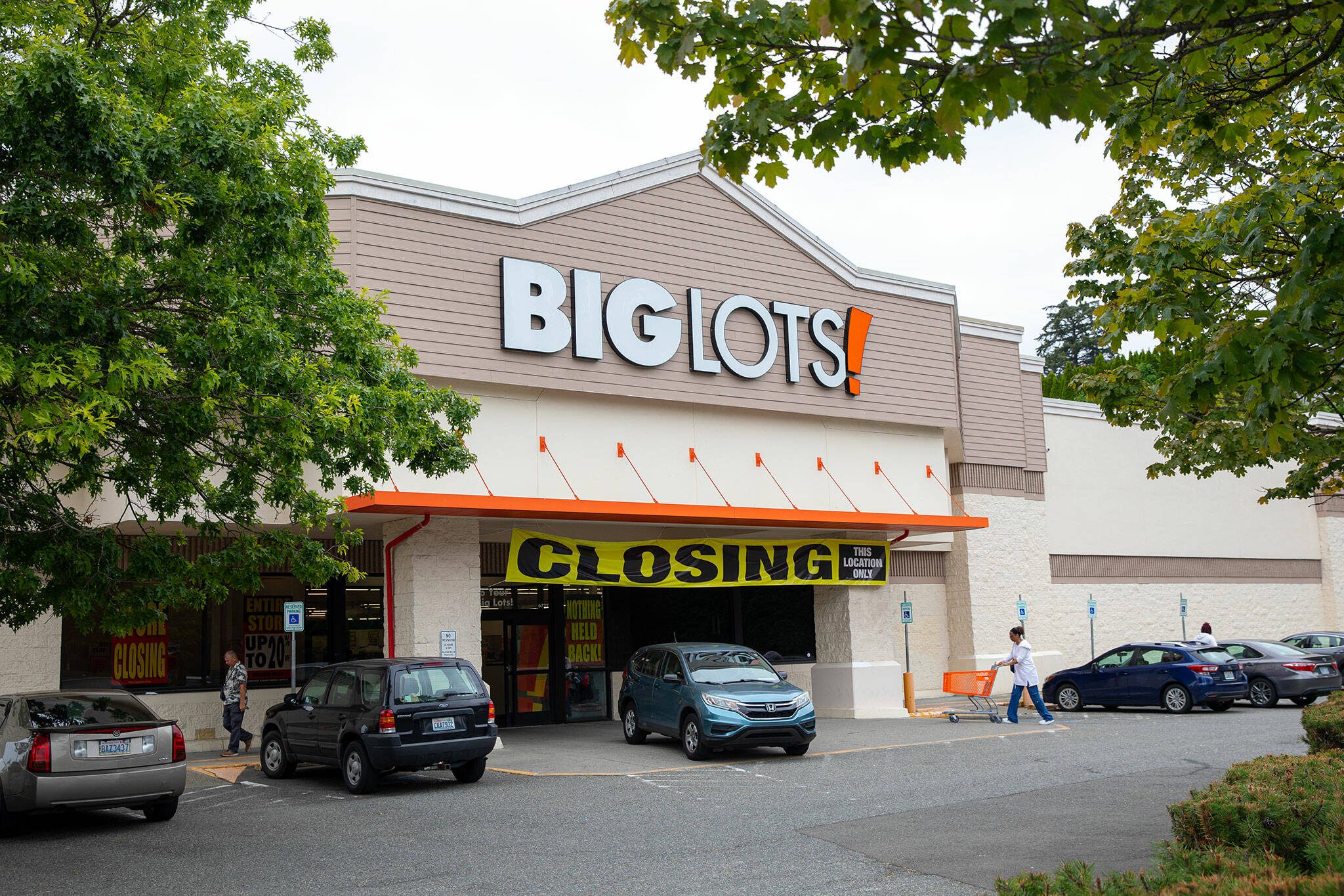 A closing sign hangs above the entrance of the Big Lots at Evergreen and Madison on Monday, July 22, 2024, in Everett, Washington. (Ryan Berry / The Herald)