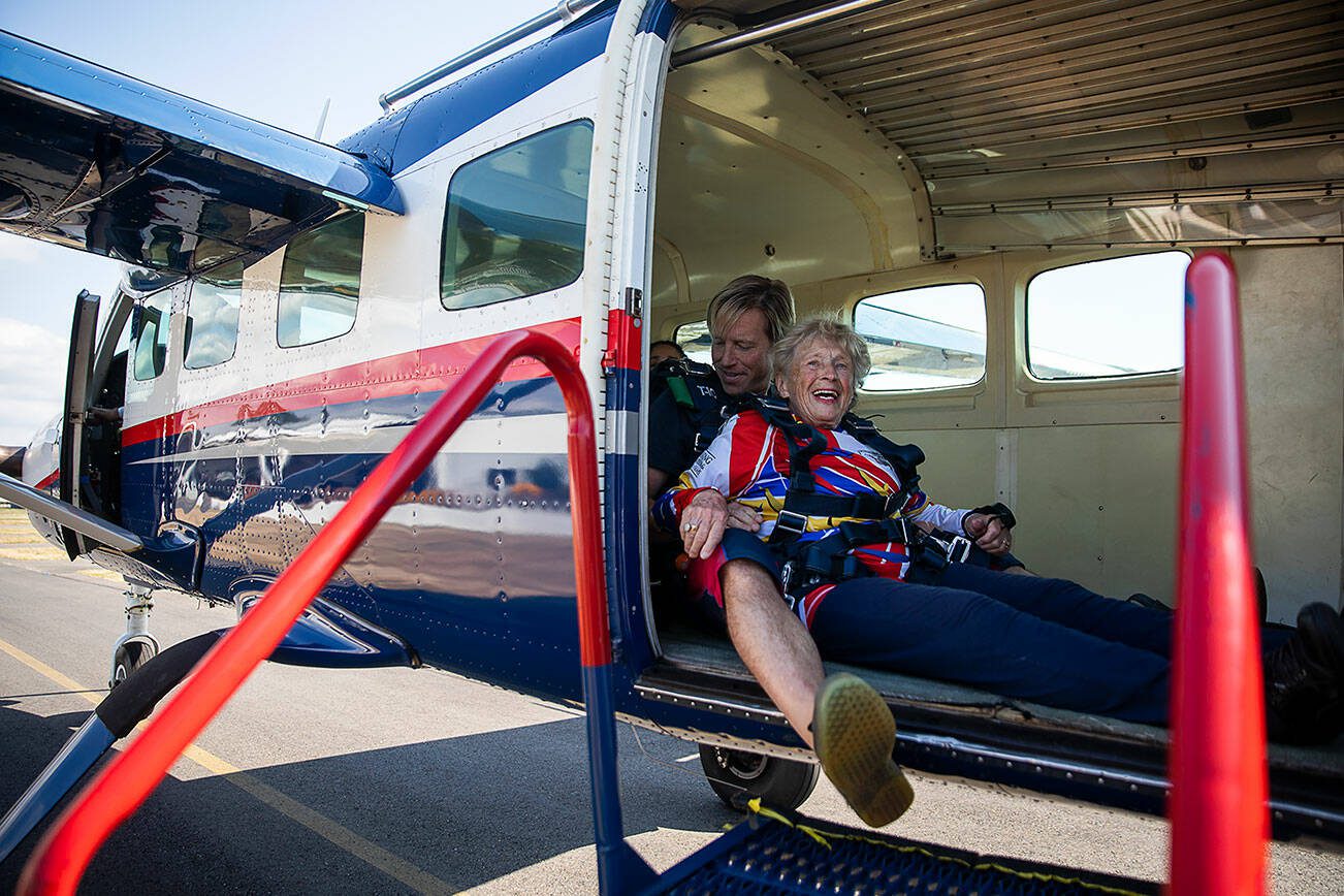 Kim Knor smiles after loading up into the airplane on Wednesday, Aug. 14, 2024 in Sultan, Washington. (Olivia Vanni / The Herald)