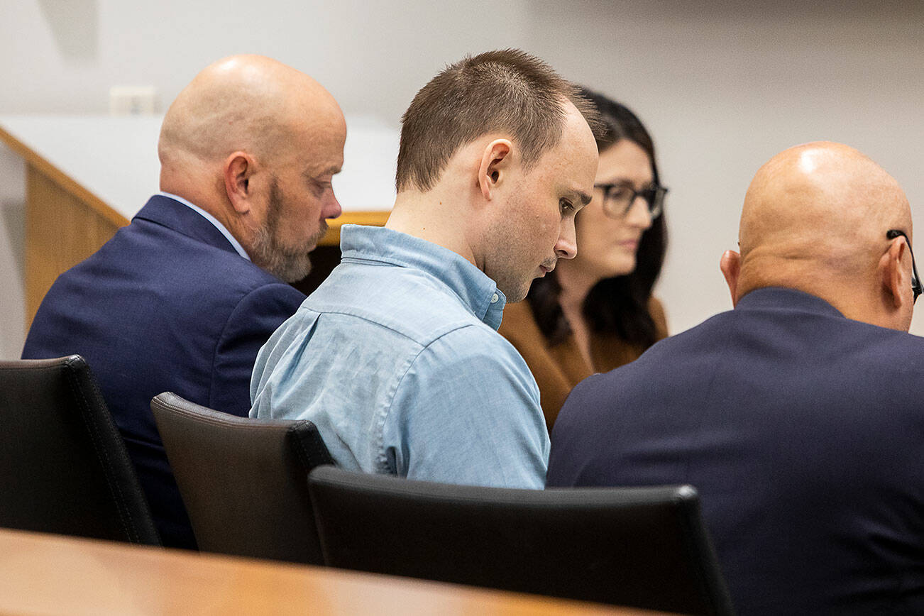 Christian Sayre sits in the courtroom before the start of jury selection for his trial at the Snohomish County Courthouse on Tuesday, Sept. 24, 2024 in Everett, Washington. (Olivia Vanni / The Herald)