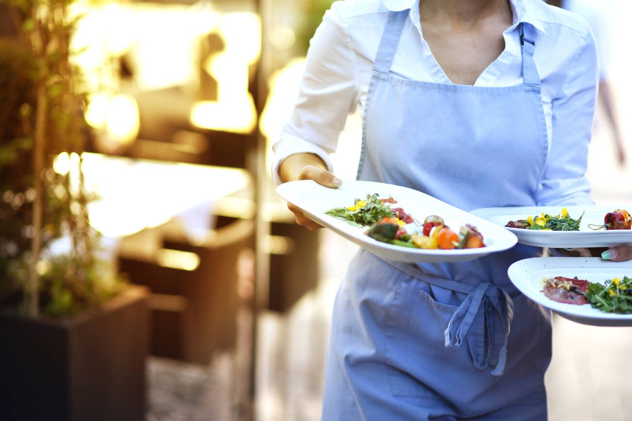 Waitress wears food at work in the restaurant