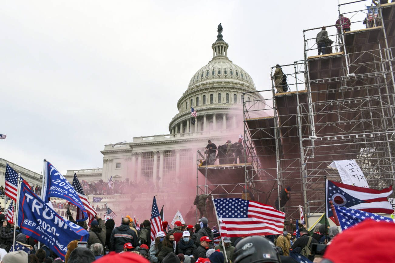 FILE — Supporters of President Donald Trump storm the U.S. Capitol in Washington, Jan. 6, 2021. The Supreme Court’s ruling that Trump enjoyed broad immunity from prosecution over official acts has opened the possibility that more evidence in his attempt to subvert the 2020 election could be revealed in public court filings — maybe even before the upcoming presidential election. (Kenny Holston/The New York Times)