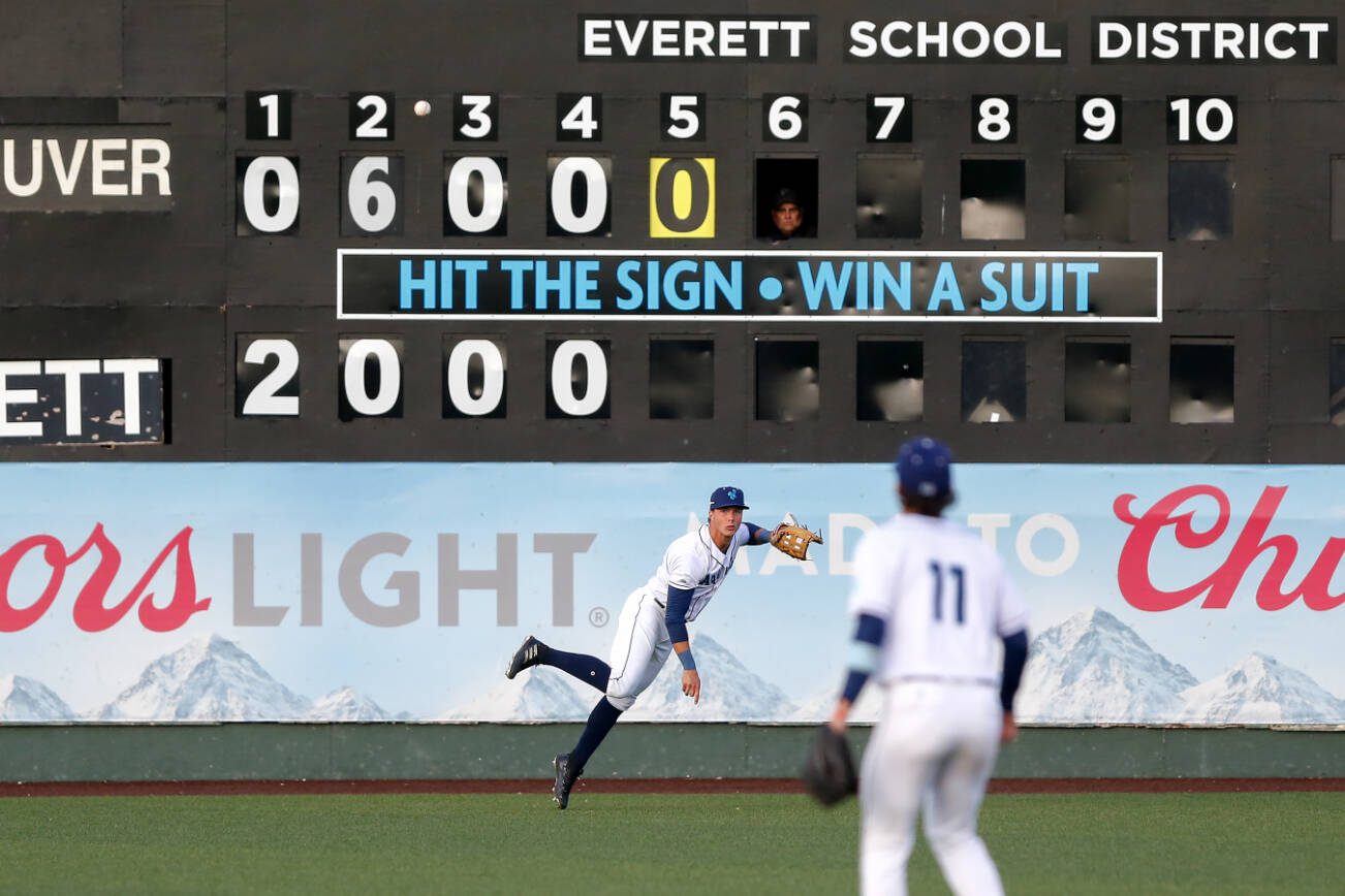 AquaSox centerfielder Jared Sundstrom throws the ball to a cutoff man during a game against the Vancouver Giants on une 5, at Funko Field in Everett. (Ryan Berry / The Herald file photo)