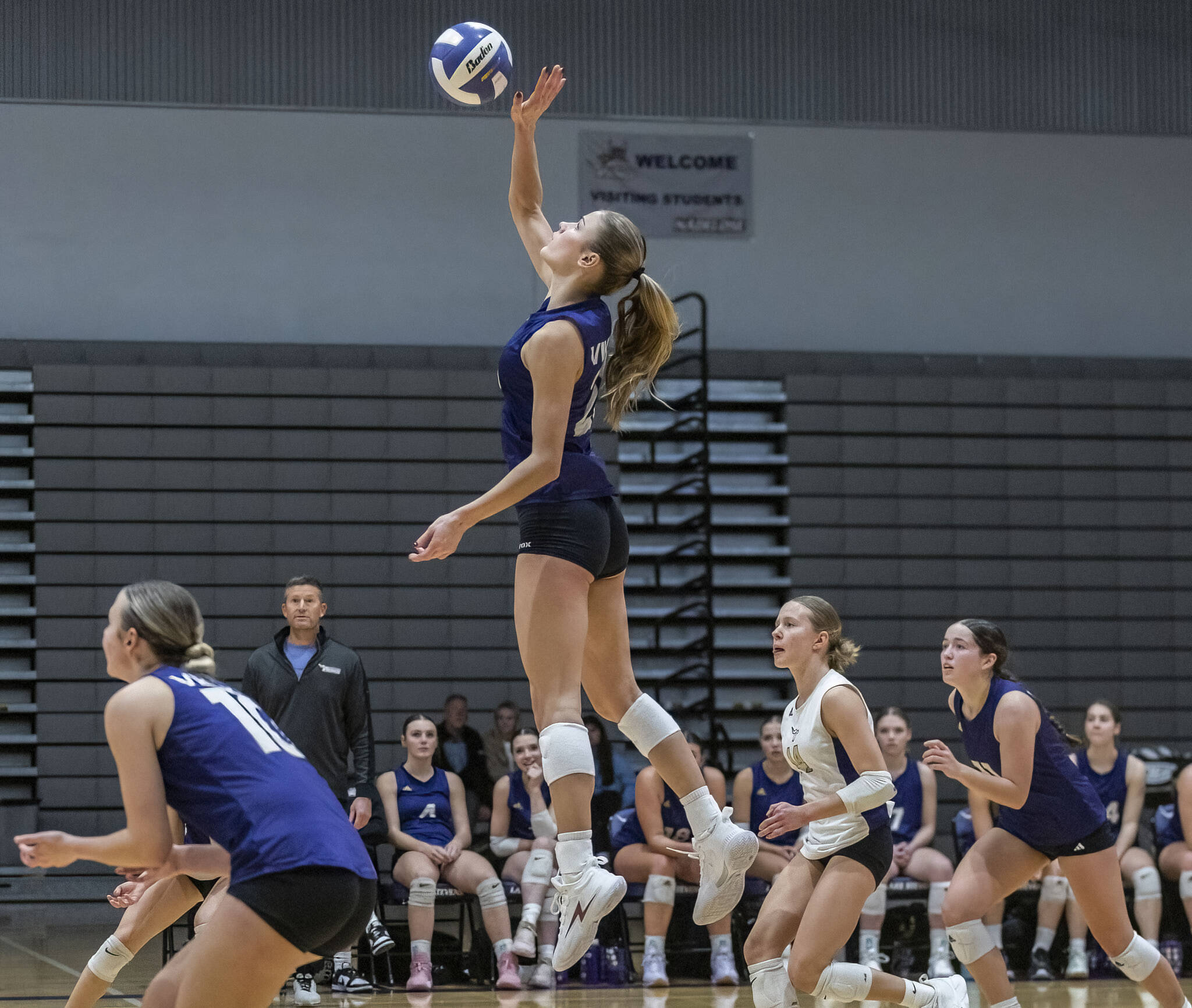 Lake Stevens’ Laura Eichert leaps in the air to hit the ball during the 4A district semifinal game on Thursday, Nov. 14, 2024 in Lynnwood, Washington. (Olivia Vanni / The Herald)