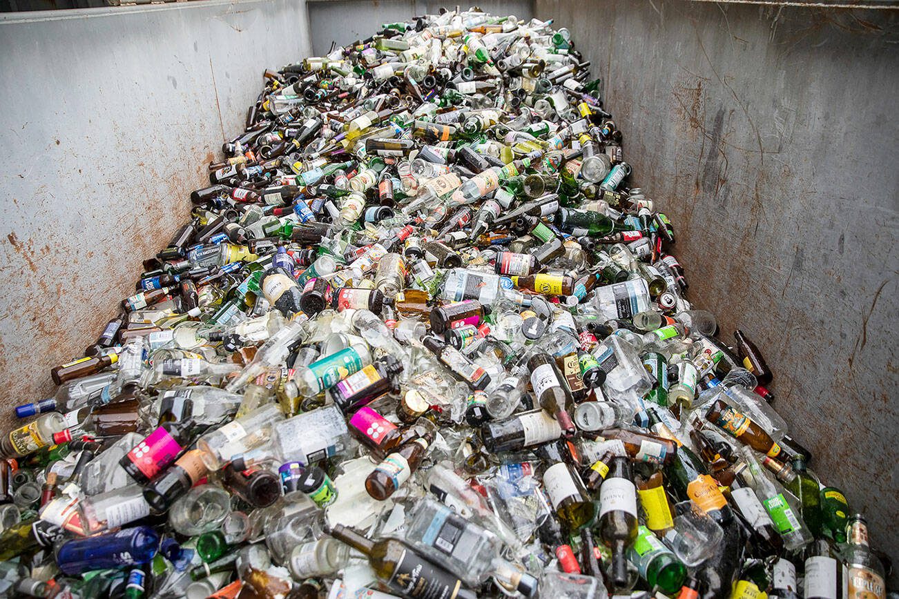 Glass recycling at Airport Road Recycling & Transfer Station on Thursday, Nov. 30, 2023 in Everett, Washington. (Olivia Vanni / The Herald)