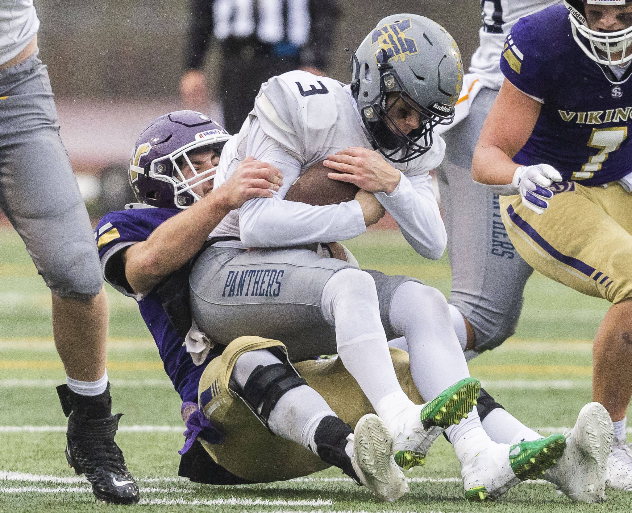 Lake Stevens’ Luke Baird sacks Mead’s Jaeland Leman during the 4A state playoff game against Lake Stevens on Saturday, Nov. 16, 2024 in Lake Stevens, Washington. Mead’s head coach, Keith Stamps, was fired on Wednesday for allegedly failing to report player misconduct. (Olivia Vanni / The Herald)