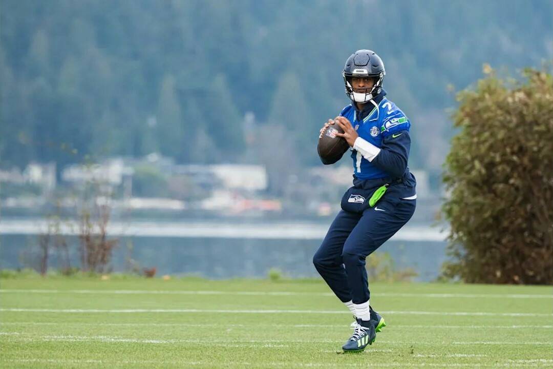 Seahawks quarterback Geno Smith prepares to throw a pass during practice at the Virginia Mason Athletic Center in Renton on Thursday, Dec. 5, 2024. (Photo courtesy of Edwin Hooper / Seattle Seahawks)