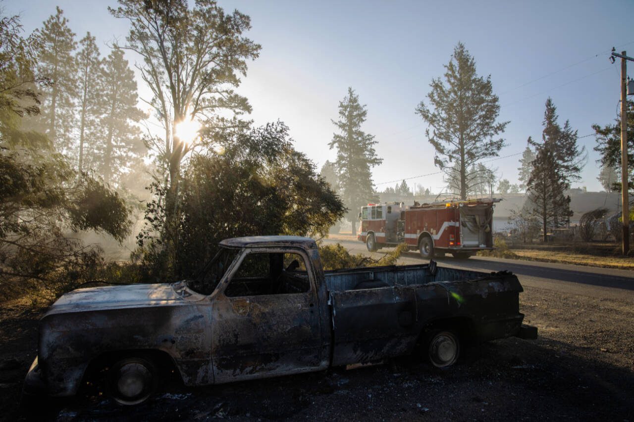 A burned-out truck in Malden, Wash., Sept. 9, 2020, two days after a fast moving wildfire swept through the area. Then-president Donald Trump rejected a request for federal disaster money following the wildfire, a tactic that state Treasurer Mike Pellicciotti is attempting to head off during the second Trump administration. (Rajah Bose / The New York Times file photo)