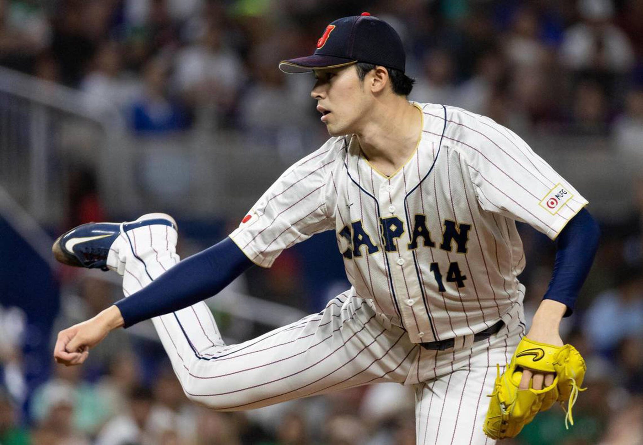 Matias J. Ocner / Miami Herald / Tribune News Services
Japan starting pitcher Roki Sasaki (14) pitches against Mexico during the second inning of a semifinal game at the World Baseball Classic at loanDepot Park in Miami in March of 2023.