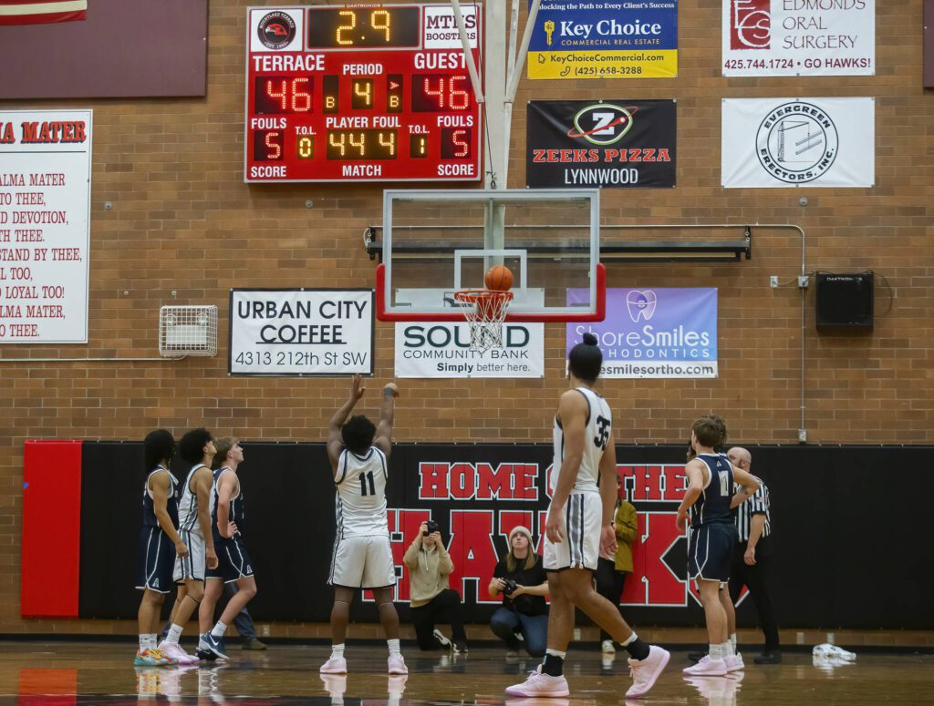 Mountlake Terrace’s Rayshaun Connor makes a free-throw to pull ahead of Arlington in the final seconds for the win on Tuesday, Dec. 10, 2024 in Mountlake Terrace, Washington. (Olivia Vanni / The Herald)
