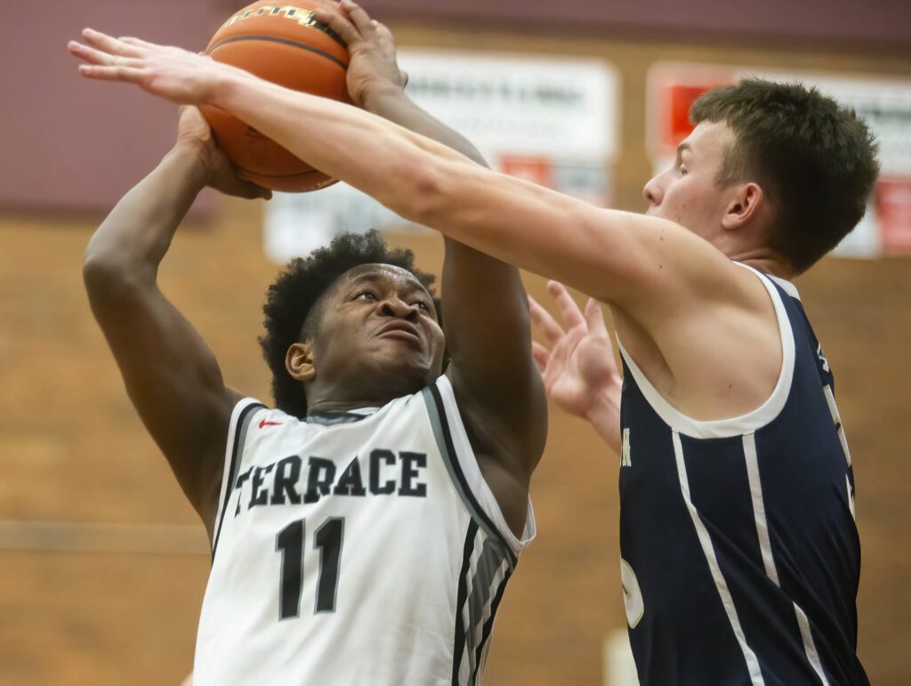 Mountlake Terrace’s Rayshaun Connor tries to take jump shot while being guarded during the game against Arlington on Tuesday, Dec. 10, 2024 in Mountlake Terrace, Washington. (Olivia Vanni / The Herald)
